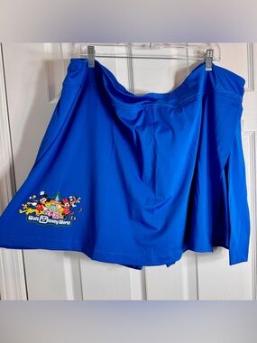 NWT Disney Parks "Play In The Park" active skort in a vibrant royal blue 3X.